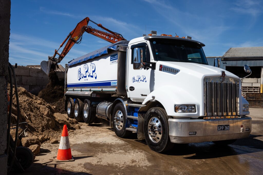 G.P.P. tipper truck being loaded by an excavator